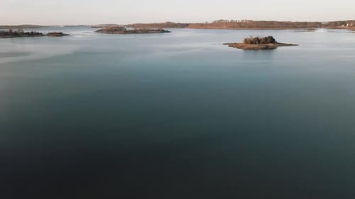 Aerial shot of a lake in Cohasset during the day - 4K