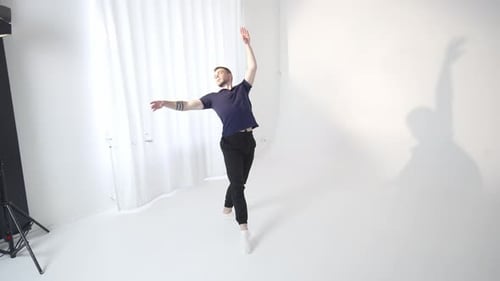 A Dynamic Dance Pose Captured in an Artistic Studio Setting with a Contemporary Flair