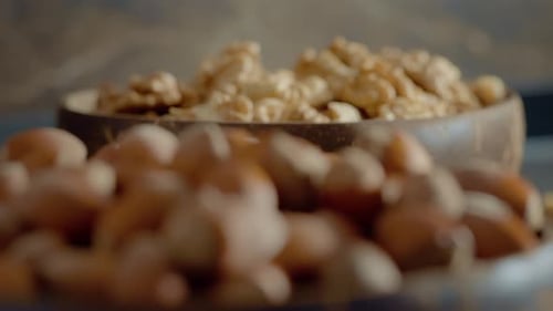 Close Up Walnuts and Hazelnuts in Bowl