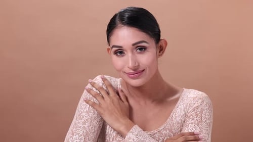 Woman Posing in a Lace Top