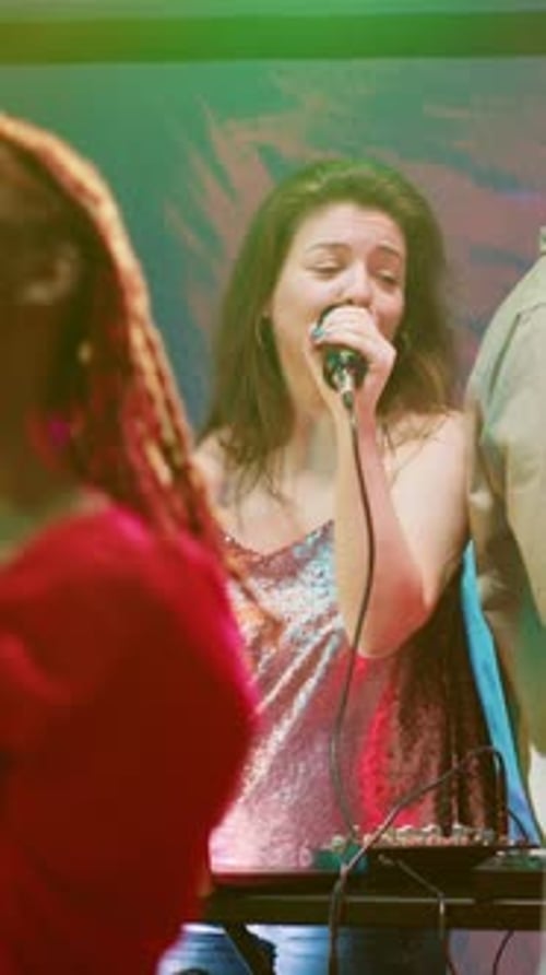 Woman Singing at Club at Night Performance