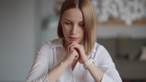 Business Woman Thinking at Home