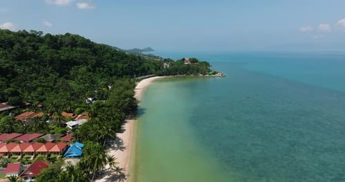 Scenic Coastline with Tropical Vegetation and Calm Waters Ko Samui Thailand