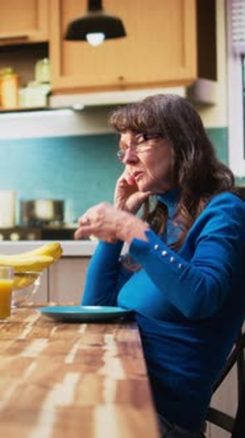 Vertical Video Mature Wife Feeling Bothered and Indifferent As Man is Chatting