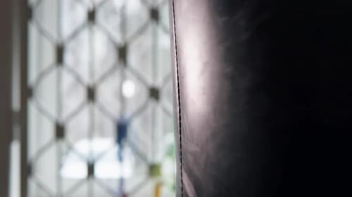 Close-up of a punch on a punching bag.
