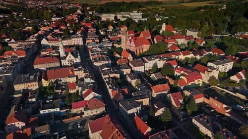 Aerial view of medieval town rooftops and church, Poland.