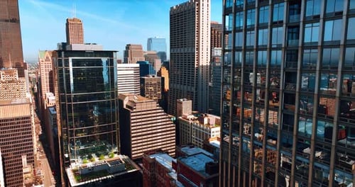 Flight among the closely standing skyscrapers in the American metropolis