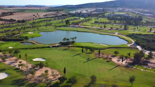 Wide Aerial View of a Luxury Green Golf Course