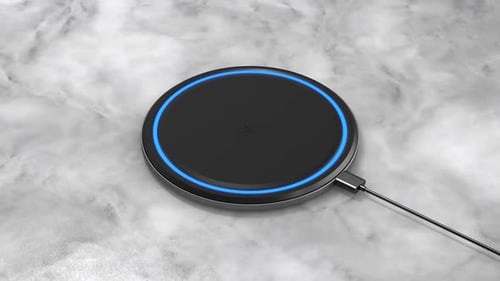 Modern Wireless Charger Activating with Blue Glow