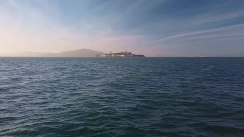 Gimbal static shot of Alcatraz Island from the San Francisco shoreline in California. 4K at 60 FPS.