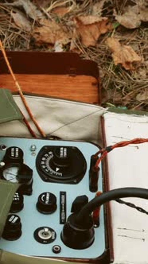Vintage Radio and Morse Code Machine in Forest