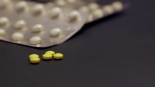 Assorted Medication Tablets and Capsules Close Up