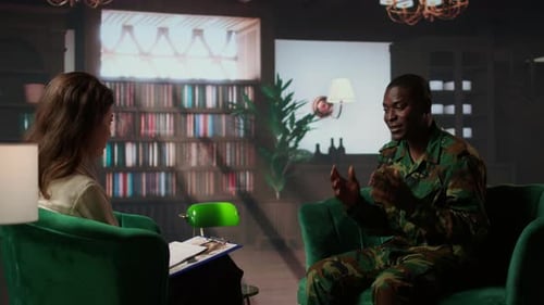 Man in Military Uniform Talking to Therapist