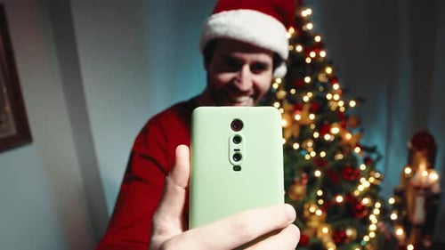 Man Wishes Merry Christmas Via Video Call