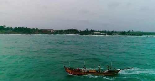 Small Boat Navigating Tropical Ocean Waters, Aerial View
