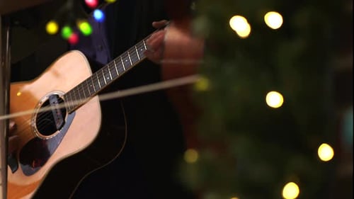 Guitarists Playing A Beautiful Christmas Song For The Holidays In Haddonfield, New Jersey, USA - Clo