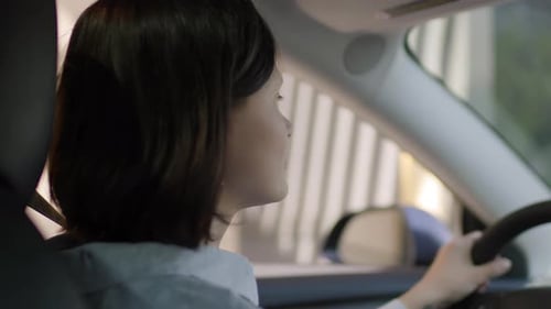 Woman Receives Food Through Car Window