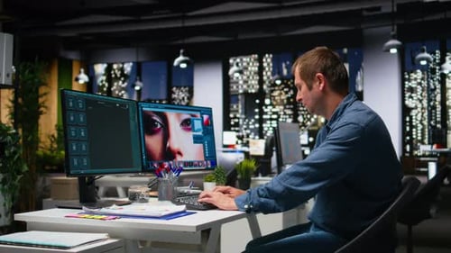 Male Photo Editor Working on Creative Retouching and Creating Materials