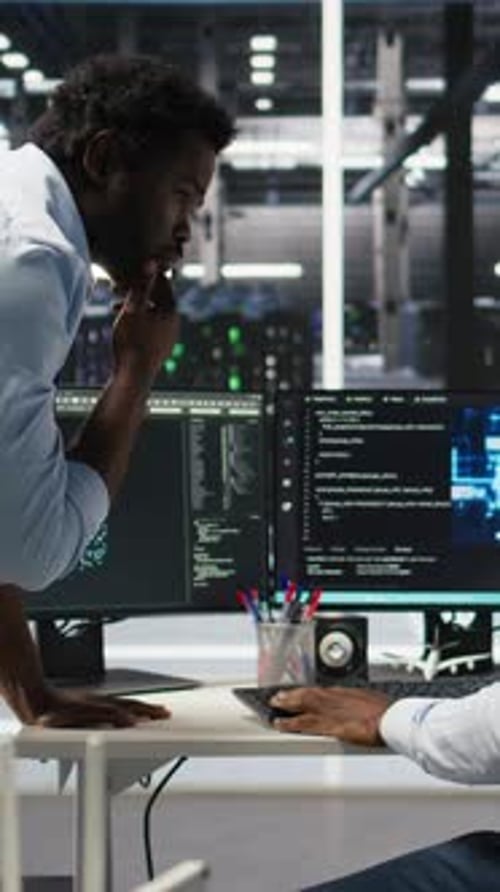 Vertical Video Pleased Data Center Manager Praising Work Done By Engineer