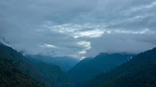 Timelapse of Clouds covering the uppermost part of Himalayas in Sainj, India.