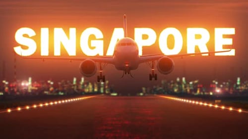 the plane is landing at the airport on the background of the inscription "Singapore"