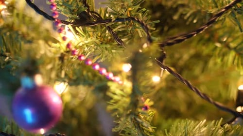 Decorated Christmas Tree with Lights and Baubles