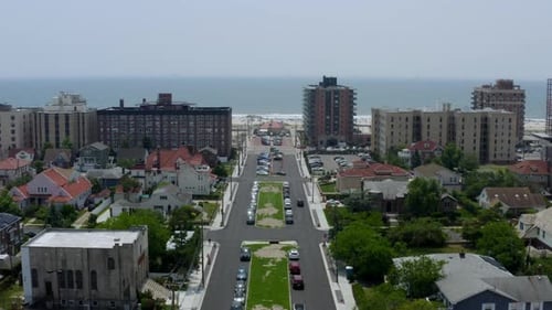 Pedestal shot of waterfront condominiums along Long Beach in Long Island