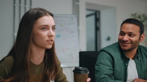 Girl Manager Telling Funny Story to Office Coworkers Sitting Together Close Up