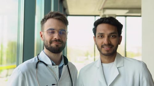 Doctors Smiling in Hospital Setting