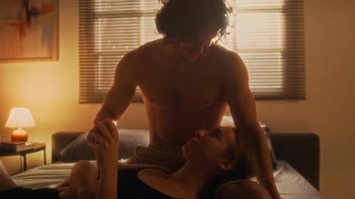 Romantic Couple Holding Hands in Warm Light