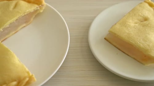 Delicious Pear Pie Wedges Served on Plates