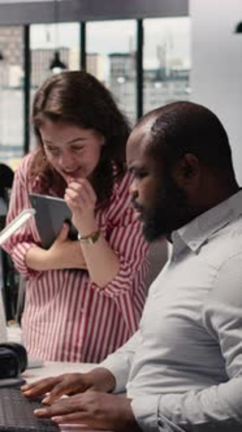 Coworkers Collaborate, Office Work, Technology, and Communication