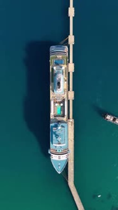 Vertical Video Big White Cruise Ship is Standing in the Port