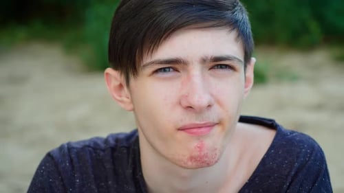 Young Adult Eating Healthy Dark Blue Berries