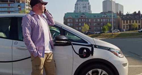 Electric Vehicle Charging Port Plugging in EV Modern Car
