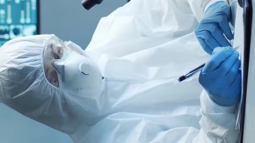 Professional Medical Doctors Working in Hospital Office Making Computer Research Medicine Healthcare