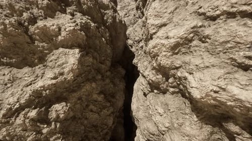 A Rock Formation with a Narrow Opening in the Middle
