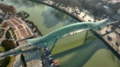 Modern Bridge of Peace Over the River in Tbilisi