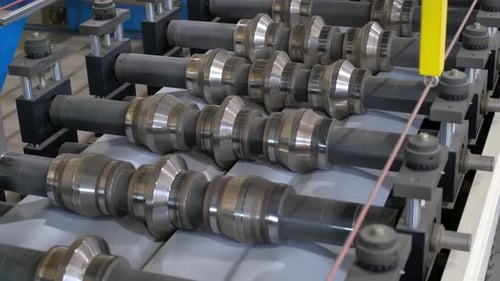 Metal Sheet Roof Production at Industrial Plant Production Line of Metal Profile at Modern Metalwork