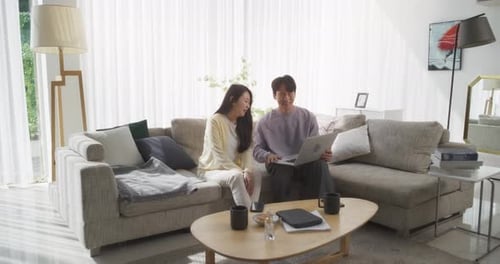 Couple Relaxing Together in the Living Room