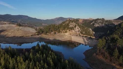 Drone view of artificial irrigation dam, water in environment