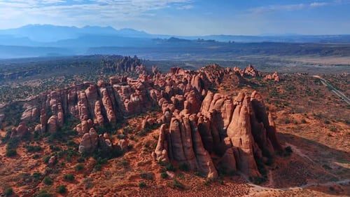 Distancing from the group of beautiful ridged rocks in the desert.