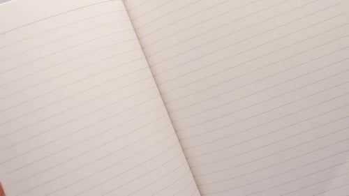 Notebook Pages Being Flipped