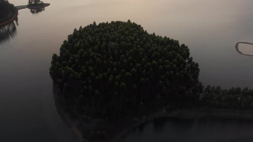 Aerial view of tranquil lake and islands at sunset, Vietnam.