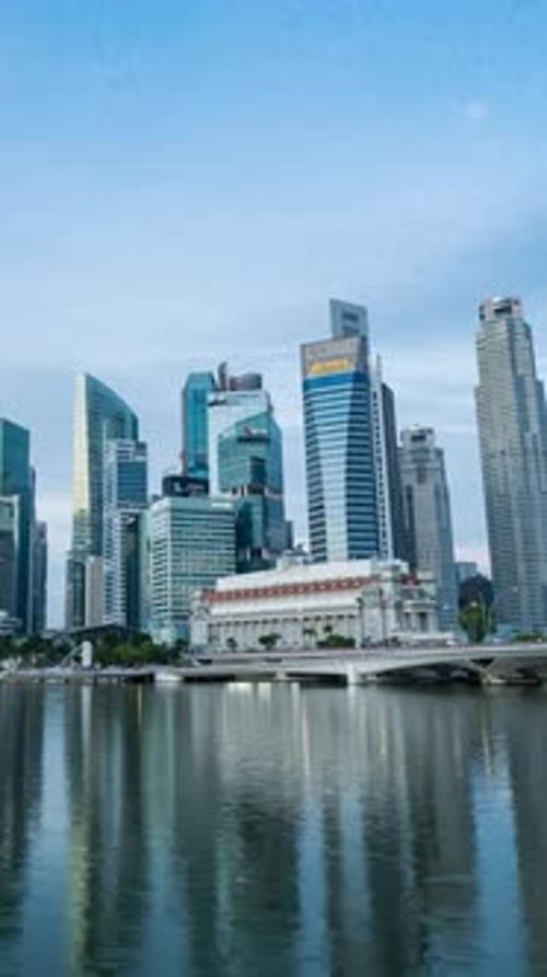 Singapore Central Business District transform from dawn to sunrise time lapse video.