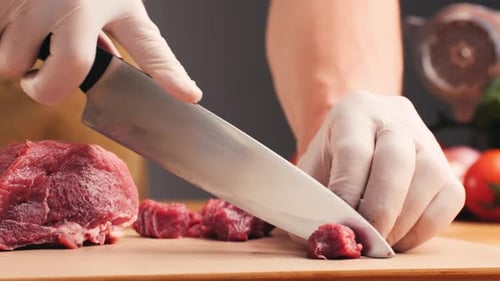 Meat Preparation: Chef Cuts Raw Meat