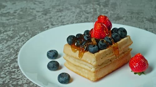 Waffle with Berries and Syrup Close Up