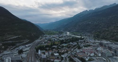 Aerial view of Visp among the Swiss Alps at sunset, Valais, Switzerland.