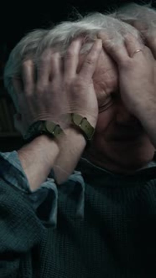 Vertical of Elderly Man Having Anxiety Attack and Feeling Overwhelmed