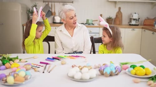 Happy Easter Two Little Girls Sisters Twins Grandmother Painting Eggs Enjoying Time Together Happy